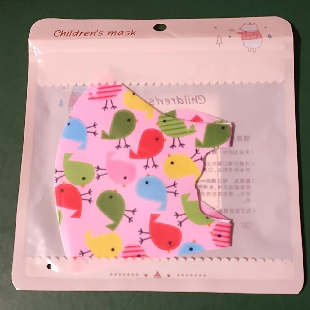Children's re Usable face mask new in package never opened